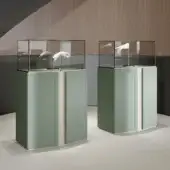 Exceptional Turri Zenit cupboard with muted green leather doors and a light display case built in Italy