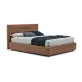 King bed, tan leather headboard, rectangular shape, dark cylindrical legs, gray duvet, blue throw, minimalist design, studio setting.