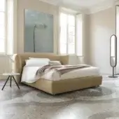 Distinguished Bolzan Letti Jill bed with enveloping winged headboard upholstered in light tan textile and subtly textured finish