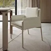 Elegant Turri Zenit armchair with light beige matte leather upholstery and sleek metal legs