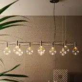 Refined Bonaldo Sofi suspension lamp with warm amber borosilicate glass globes and burnished brass cylinder supporting clear glass spheres