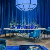 Distinguished Turri Azul table with shaped light marble tabletop and sinuous iridescent green/blue liquid painted metal base