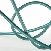 Iridescent sculpture of intertwined green-blue tubes, complex knot-like form, metallic sheen, abstract modern art on white surface.