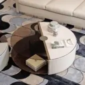 Elegant Turri Eclipse coffee table with light material, dark tinted glass, and a light gold metal band