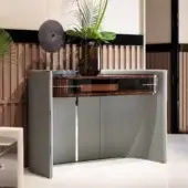Exclusive Turri Eclipse console with a curved light gray leather shell and glossy lacquered wood, accented with gold metal and bronze glass