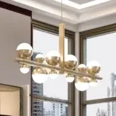Avant-garde Turri Eclipse suspension lamp with opaque white spheres and satin bronze metal built with leather details