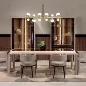 Distinguished Turri Eclipse table with light beige high-gloss top, rounded leather edges and grooved wooden legs built with gold metal details