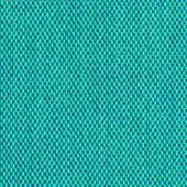 Turquoise circular pattern with deep blue outlines, featuring woven texture and subtle text identifying “horm > kvadrat steelcut trio” details.