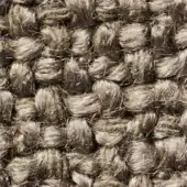 Coarse jute fabric texture, muted marigold color, dense nubby weave with rounded knots and tonal variations, natural fiber textile sample.