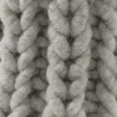 Knitted fabric texture, muted gray wool yarn, dense looped nubby surface with granny square chain stitch motif.