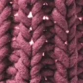Knitted wool texture in muted red, displaying a dense granny stitch pattern with looped yarn and a fuzzy, velvety finish.