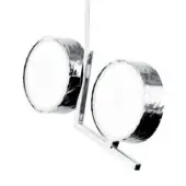 Wall-mounted light fixture, silver metal, two circular matte white shades connected by a vertical hammered rectangular bar with angled support.
