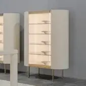 Distinguished Turri Roma showcase with a central glass door, cream leather upholstery and champagne gold finished metal details