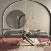 Lavish Bontempi Artistico Barrel table with dark gray and white veined marble-like top crafted in gold-toned crossed metal