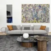 Superior Horm Ella sofa, a three-seater upholstered in light gray textile with smooth matte finish and dark metal base