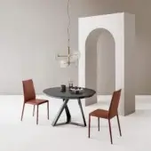 Exceptional Bontempi Millennium round extendable table with a dark tabletop and geometrically shaped metal base crafted in Italy