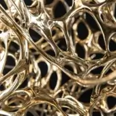 Distinguished Terzani Dragon suspended sculpture handcrafted in glossy golden metal evokes cosmic harmony with a unique cell-like structure