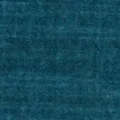 Teal velvet fabric sample displaying a dense, short pile texture with tonal variations and subtle shading across the surface.