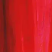 Red velvet fabric with vertical folds displays a dense pile and soft sheen, identified as Lagune Velvet 71253 Carmen 008 textile.