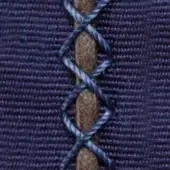 Woven textile detail, brown and blue cords in a crisscross pattern on dark blue fabric, with vertical text “borzalino > trap > trap combinations”.