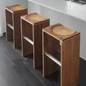Distinguished Horm Ripples stool with saddle seat crafted in laminated composite walnut, mahogany, cherry, oak and ash with hand-finished details