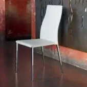 Elegant Bontempi Tai chair with curved silhouette upholstered in white synthetic material and reflective metal legs