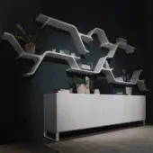 Distinguished Horm Sinapsi shelf, a modular shelving unit crafted in lacquered-polyurethane with interconnected curving planes for display