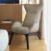 Superior Horm Soho lounge chair with light beige patterned fabric upholstery and dark-stained wood legs