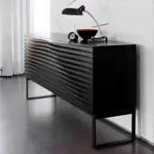 Exceptional Horm Tide sideboard crafted with wave-like evenly-spaced MDF sheets in matte black finish for capacious storage
