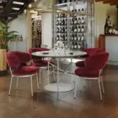 Distinguished Horm Vendome armchair with enveloping backrest in deep red upholstery and matte white metal frame