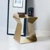 Elegant Bontempi Kito side table with sculptural metal form and uniform gold tone finish