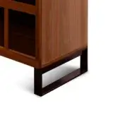 Walnut cabinet with rectangular cutouts, dark metal base, recessed center, matte finish, minimalist modern design, studio shot.