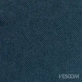 Teal woven fabric texture with silver flecks, displaying a granular surface and visible yarn structure; “VESCOM” logo imprinted.