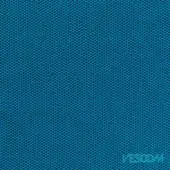 Sapphire blue Vescom textile features a dense, woven fabric texture with a uniform pattern and subtle granular surface detail.