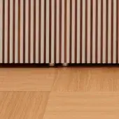 Sofa side panel with brown and cream striped wood, dark wood cylindrical feet, on golden-brown hardwood flooring with visible grain.