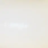 White wall with rectangular recessed light, bright glare, matte finish, subtle texture, uniform illumination, elongated light shape.