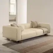Distinguished Horm Coleman sofa with light beige textile and solid canaletto walnut feet, showcasing two red-lined cushions