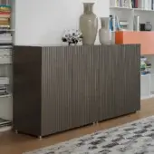 Sophisticated Horm Leon sideboard with monochrome lacquer and vertically ribbed doors creating a shifting optical effect