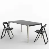 Distinctive Casamania Bek chair crafted in matte black synthetic material with a triangular opening backrest and fiberglass reinforced construction