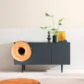 Elegant Miniforms Caruso bar cabinet in dark gray with a matte finish and reflective copper circular detail