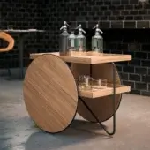 Exceptional Casamania Chariot bar cart crafted in Italy with curved lines and a black metal structure alongside rectangular wooden shelves