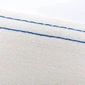 Off-white woven fabric with diagonal stitching in ral5017 traffic blue, matte texture, visible threads, neutral white background.