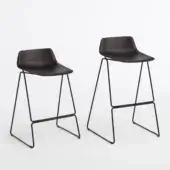 Exceptional Casamania Pressious stool with bent plywood beech seat and black metal sleigh base crafted in Italy