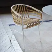 Superior Casamania Raphia armchair with woven rattan and matte white metal frame crafted in Italy
