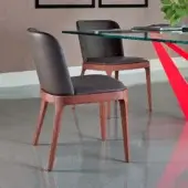 Superior Cattelan Italia Magda chair with gently sloping padded backrest and reddish-brown solid wood frame in leather-textured upholstery