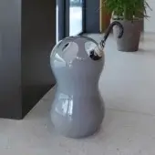 Exceptional Casamania Zontik umbrella stand with organic silhouette crafted in glossy grey synthetic material