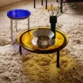 Exclusive Miniforms Zigo coffee table with concentric centres and gold-toned finish alongside black accents