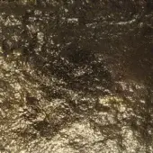Bush hammered glass texture with mottled bronze and silver tones, displaying an irregular pattern of indentations and reflective highlights.