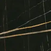 Glossy Sahara Noir marble glass texture with black base and irregular veins of gold, ochre, and white, displaying a polished, reflective surface.