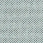 Light blue textile with circular umber perforations, woven structure, and irregular surface; studio sample, lapalma fabric umber 66251.